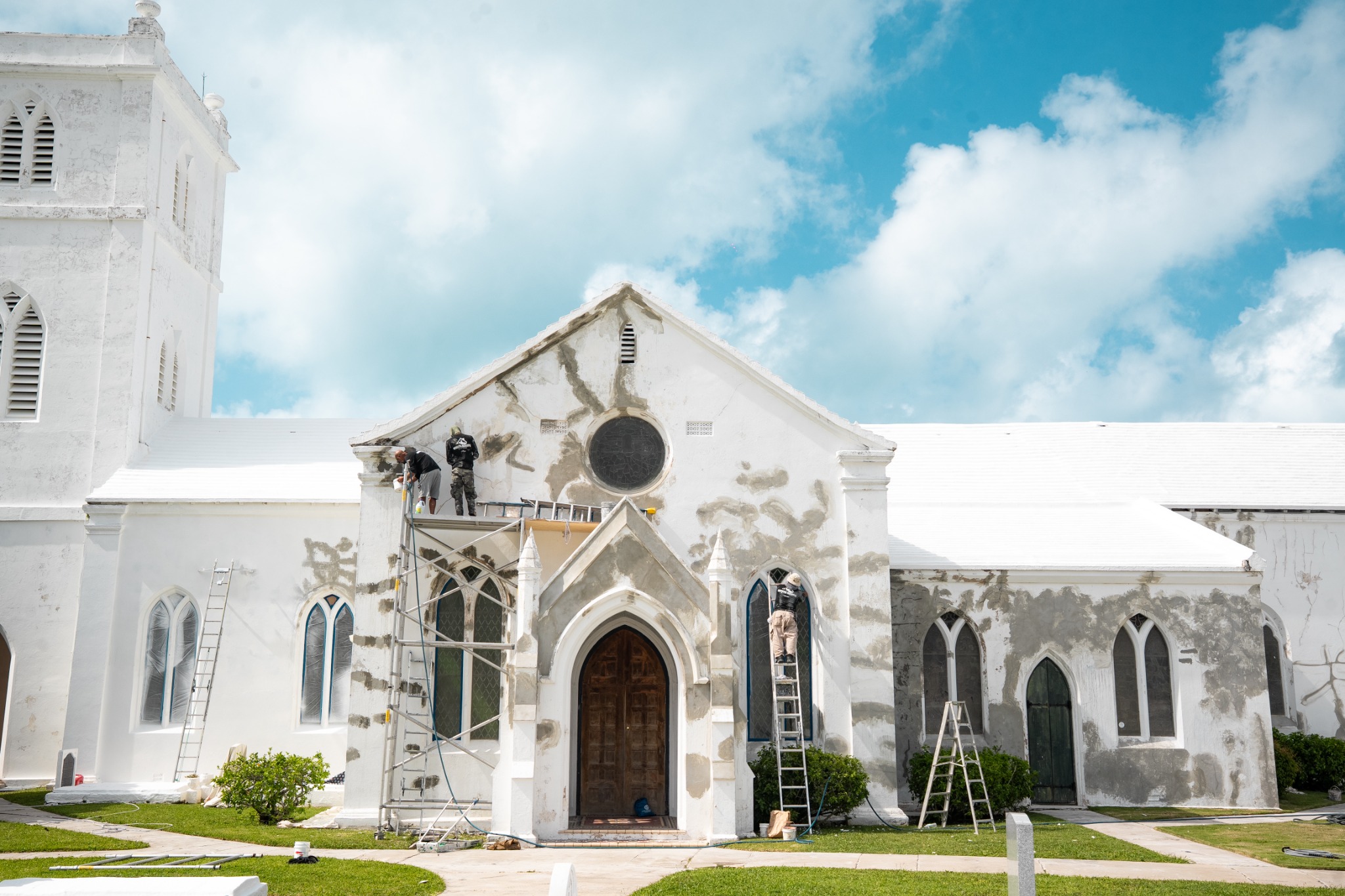 White Roofs team restoring the exterior of a Bermuda church